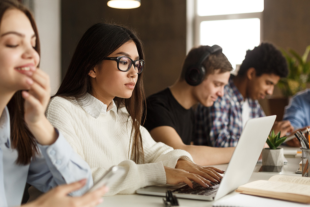 International students studying in computer lab